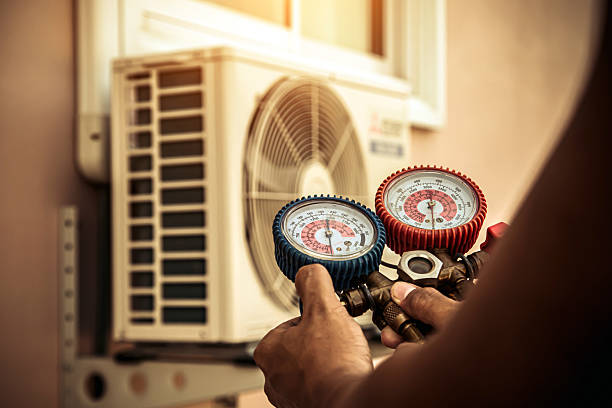 Professional Air Conditioning Service technician working in Benton Harbor, MI